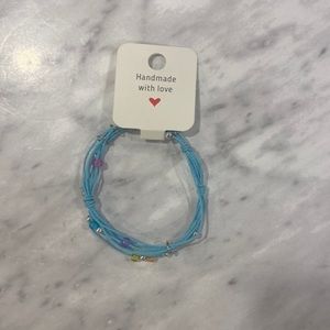 Kid’s size, blue bracelet